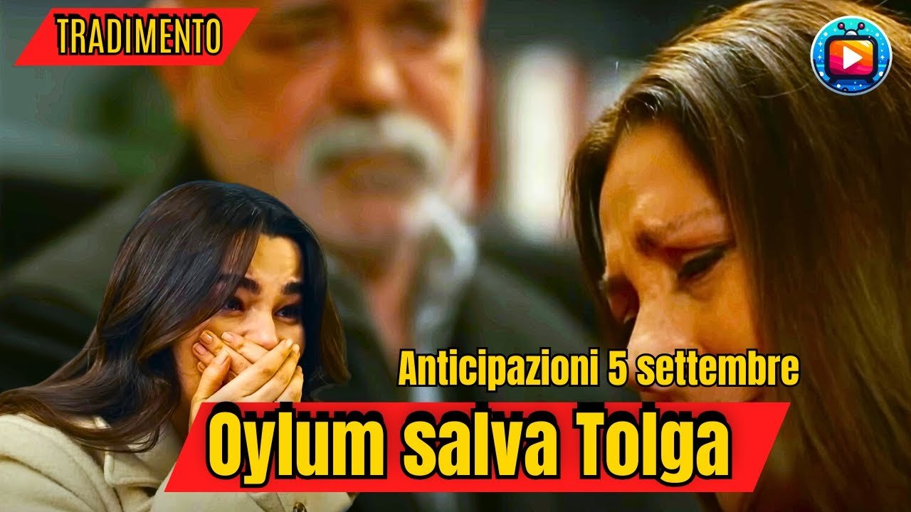 Oylum in lacrime si copre la bocca con le mani; accanto a lei una donna dai capelli lunghi tiene il viso chino e gli occhi chiusi, mentre sullo sfondo sfocato un uomo anziano con la barba bianca guarda in basso.